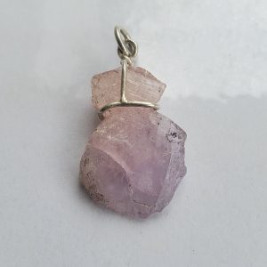 Raw pink tanzanite pendant